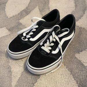 Big kids black and white Vans shoes